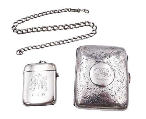 1920s silver cigarette case, of rectangular form, with engraved scroll decoration and later applied engraved circular central