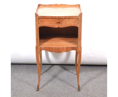 French kingwood bedside table, serpentine outlines, the top with three quarter gallery, frieze drawer above a shelf, cabriole