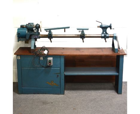Wood-turning Modeller's lathe, "The Major."by The Coronet Tool Co., bench 1.6m x 40.6cm lathe 1.5m, along with a quantity of 
