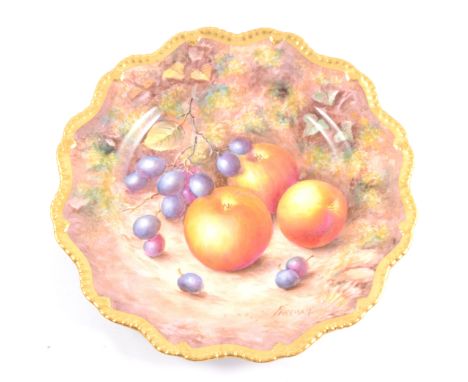 Royal Worcester cabinet plate, painted with fruit, by John Freeman, wavy outline, 22.5cm diameter.