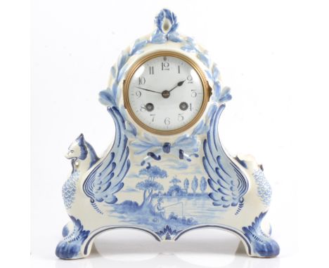 cmFrench pottery mantel clock, blue and white decorated, French cylinder movement striking on a bell, 29cm, with pendulum, ca