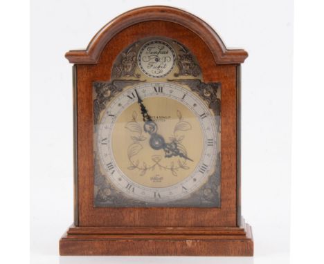 Small Elliott mantel clock, signed Pearce &amp; Sons Limited, Leicester, 16.5cm; and an oak cased aneroid barometer.