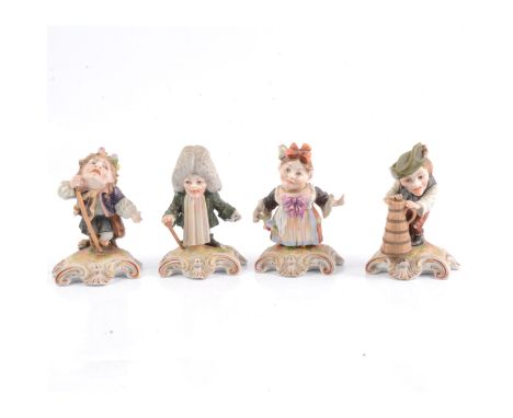 Four Derby figures of London street characters, including a hunchback with water pitcher, buxom flower seller, sorrowful gent