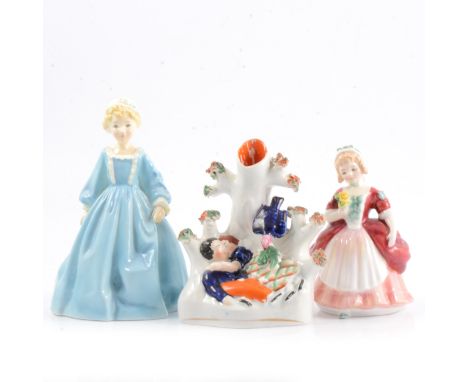 Royal Worcester figure, Grandmother's Dress; Royal Doulton figure, Valerie, HN2107; and a Staffordshire spill vase, Babes in 