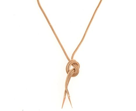 A yellow metal 1.8mm gauge square foxtail link necklace with knot motif and two strand tassel, necklace length 38cm with 2cm 