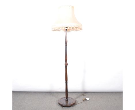 Beech standard lamp, turned colum, curcular base, with shade, height 185cm.