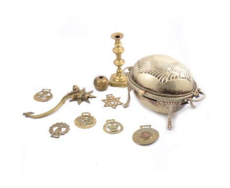A silver-plated platter, 52.5cm; another smaller platter; a serving dish on stand; a brass candlestick; and other metalware.