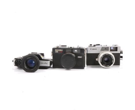 Three vintage cameras including Canon Canonet 28 with 40mm lens and booklet; Ricoh 35 ZF with 40mm lens; Minolta 110 Zoom SLR