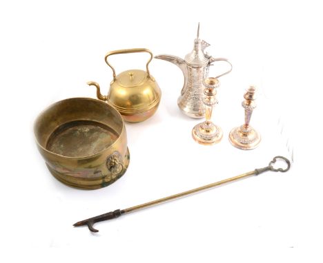 Large quantity of mixed brass and metalwares, including balance scales base, tea urns, fireside companions, brass door handle