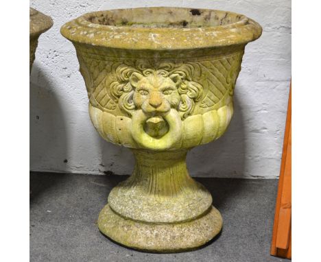 Pair of modern stone pedestal planters, circular bowls with cast baskets of flowers and lion ring masks, tapering column, dia