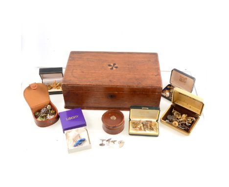 A mahogany box with star inlay to lid, 30 x 17 x 10cm, containing leather stud boxes and jewel boxes, a pair of silver masoni