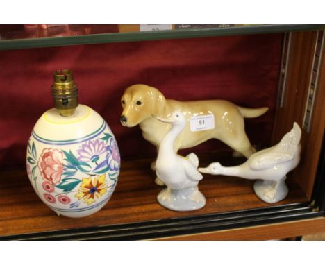 Two Nao geese; a Coopercraft Labrador; and a Poole pottery table lamp base