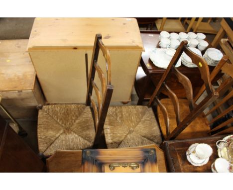 A pair of ladder back and rush seated chairs 