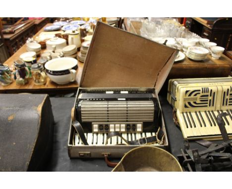 A Hohner piano accordion in carrying case 