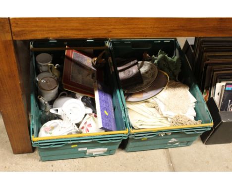 Two crates of various textiles and china, place mats etc. 