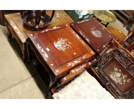 A pair of Chinese hardwood and mother of pearl inlaid square topped tables 