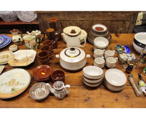 A quantity of Poole pottery bowls and dinner plates; Beswick treacle glazed coffee set etc. 