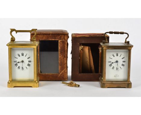 Two late 19th Century brass carriage clocks, both with white enamel dials with Roman numerals, one marked 'Lisle Exeter', hei