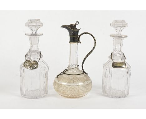 A pair of 20th Century glass decanters,  moulded glass with stoppers, with 'Whiskey' and 'Claret' labels, height 28cm, togeth