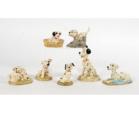 Seven Royal Doulton '101 Dalmatians Collection' figures, including 'Rolly', 'Penny', 'Patch in Basket', 'Penny and Freckles',