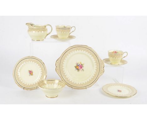 A part Paragon tea set,  in the Stratford pattern, with serving plate, diameter 25.5cm, small jug, sugar bowl, and six cups a