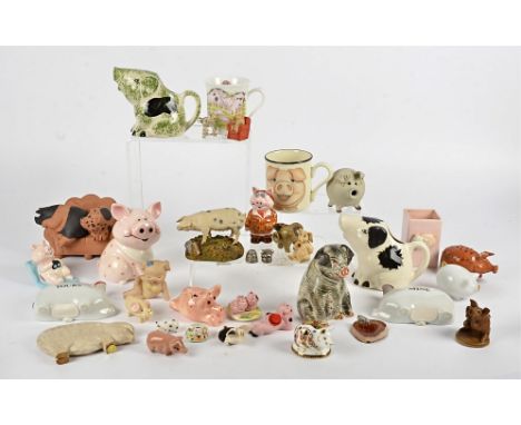 A large collection of pig figurines and ephemera, in glass, pottery, ceramic, resin and metal and more, including a Royal Cro