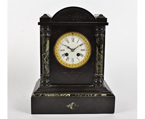 A Victorian slate mantel clock with applied marble detail, white enamel dial with Roman numerals, on a plinth base, movement 