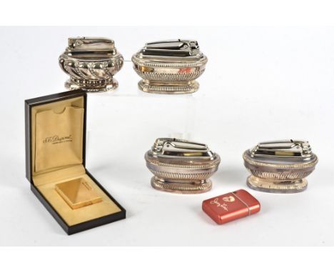 A Dupont boxed lighter,  together with four Ronson lighters and the 'Storm Master' Jerry Lewis lighter (6)