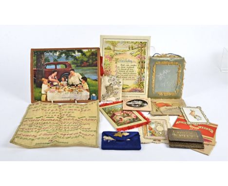 A 19th Century alphabet and prayer sampler by Louisa E Bovey, aged 12 years, in red and green thread, 23.5cm x 23.5cm, togeth