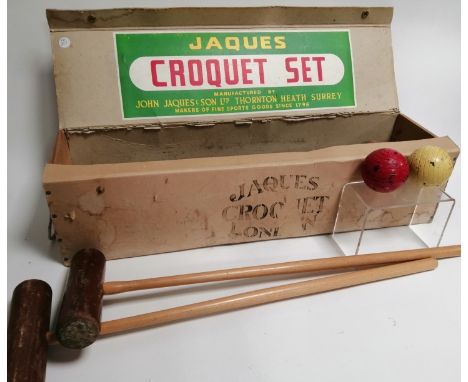 A vintage Jacques croquet set,  in original box, consisting of nine balls, four mallets, one stake, four hoops, 