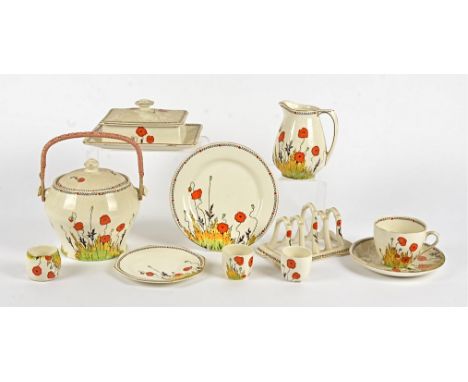 A large quantity of Crown Ducal Poppy pattern A1915 table wares,  to include two butter dishes, a biscuit barrel, height 15cm