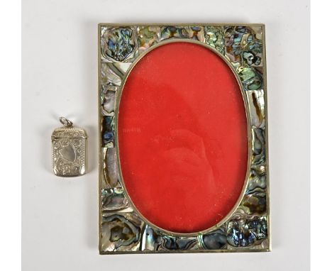 An Edwardian hallmarked silver vesta case with shield and foliate decoration,  dimensions approximately 3cm x 2cm, together w