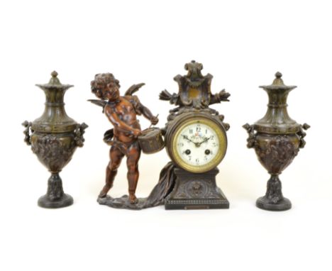 A late 19th/early 20th Century French spelter clock garniture,  after L &amp; F Moreau, titled 'Enfant au Tambour', featuring