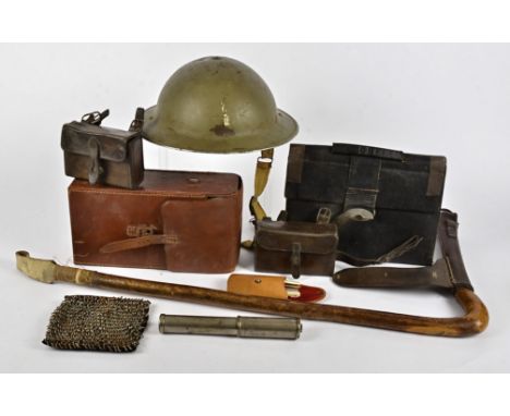 A small quantity of military collectables and other early 20th Century objects,    including a British Army helmet and trench