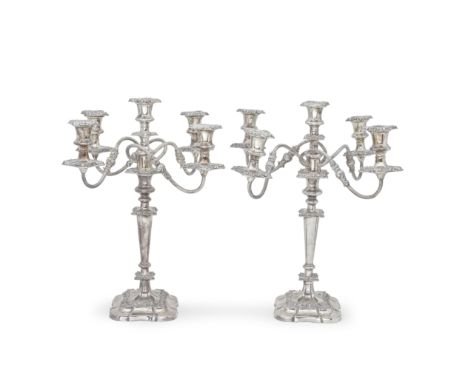 A pair of Old Sheffield plate five-light candelabraunmarked, 19th centuryKnopped baluster form columns with foliate bands, de