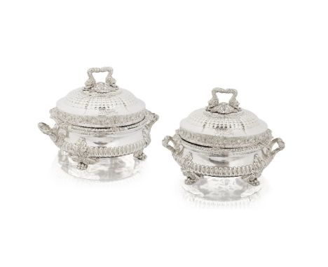 Two George III silver entrée dishes and covers on Old Sheffield plate warming basesPaul Storr, entrée dishes,  the bases Lond