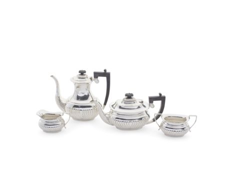 A silver four-piece tea and coffee serviceJ B Chatterley &amp; Sons Ltd, Birmingham 1975 Oblong form with part fluted bellied