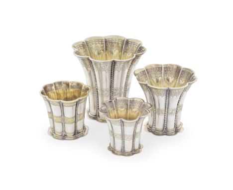 A set of three 20th century Danish silver and parcel-gilt graduated Margrethe Cups and one otherSvend Toxvaerd, Copenhagen ci