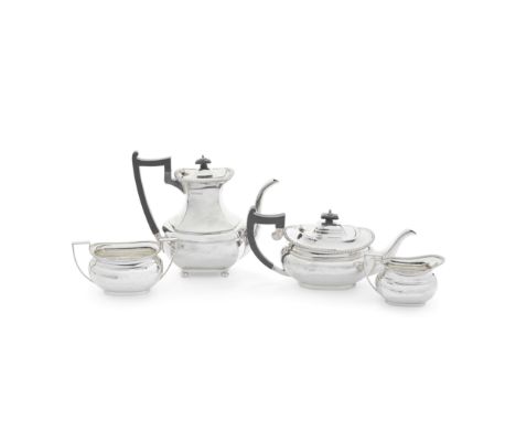A silver three-piece tea service together with a matched silver coffee potCharles William Fletcher, Sheffield 1922, the coffe