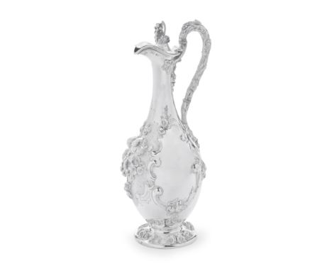 A Victorian silver wine ewerDaniel and Charles Houle doublestruck, London 1861, duty mark Ovoid form, with elongated tapering