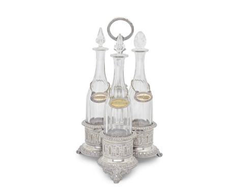 A large Maltese silver decanter stand with glass bottlesno maker's mark, period 1920-1964, stamped 917M, underneath incuse 'K