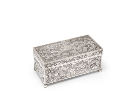 A Chinese export silver cigarette boxstamped WA and character mark, late 19th century Rectangular form with hinged cover, on 