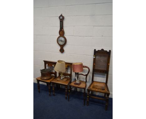 A PAIR OF EDWARDIAN MAHOGANY HALL CHAIRS, together with a carved oak hall chair with a high back (missing cane seat) brass bu