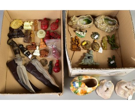 A BOX OF ORIENTAL HARDSTONE CARVINGS, CERAMIC FIGURES, RESIN SNUFF BOTTLES ETC, including two Indian style daggers, a green s