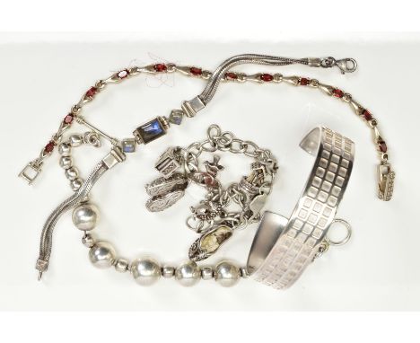 A SELECTION OF JEWELLERY, to include a silver square embossed detailed bangle, hallmarked London, a line bracelet set with ov