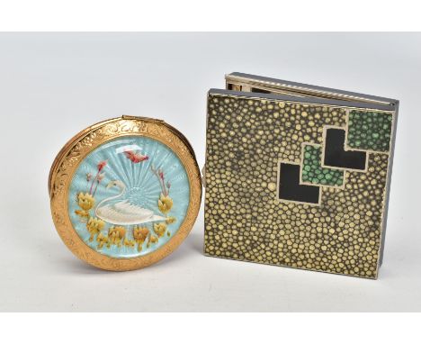 TWO COMPACTS, to include a circular compact, blue guilloche enamel with swan and foliage detailing to the front, floral embos