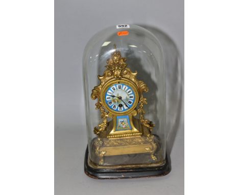 A LATE 19TH CENTURY ORMOLU MANTEL CLOCK WITH PORCELAIN DIAL AND PLAQUE, Roman numerals to dial, together with wooden base and