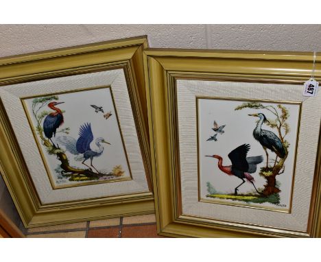 TWO HAND PAINTED PORCELAIN PLAQUES depicting wading birds, signed 'Algora' to the front, printed Algora backstamps, framed, a