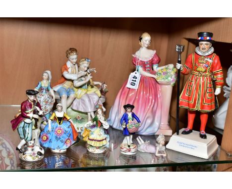 A GROUP OF PORCELAIN FIGURES, including Royal Doulton 'Roseanna', HN1926, nibbles to roses, a Goebel 'Chief Yeoman Warder Tow