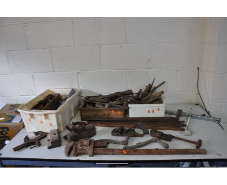 THREE BOXES OF VINTAGE HAND TOOLS including wooden planes, bow saw, a distressed wooden tripod, two carver clamps, brace bits